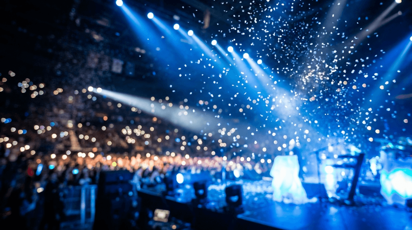 Celebratory arena atmosphere with blue lights and falling confetti.